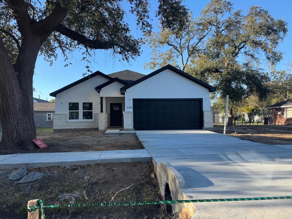8305 Jennings, Houston, TX 77017 - view of front of house with a garage