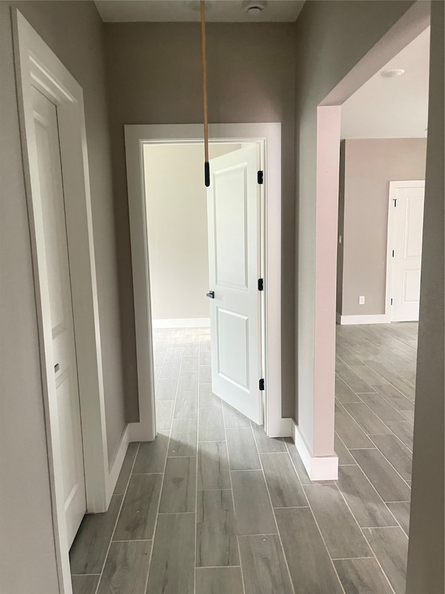 hall featuring dark hardwood / wood-style floors