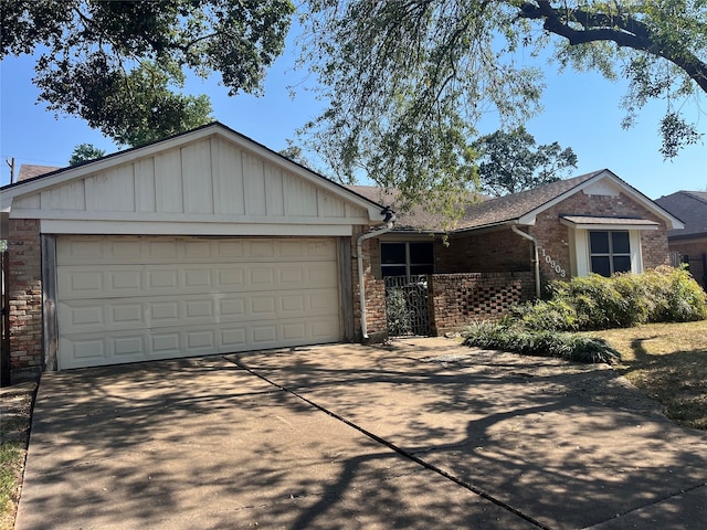 ranch-style home with a garage