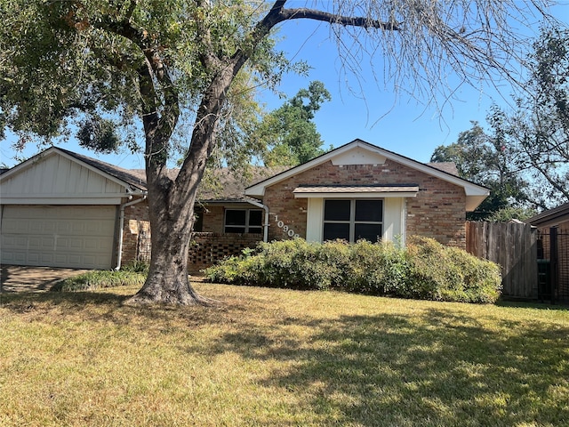 ranch-style house with a front lawn