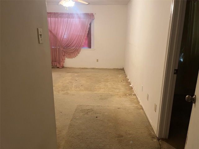 spare room with ceiling fan