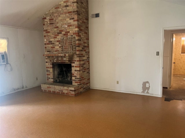 unfurnished living room with a fireplace and vaulted ceiling