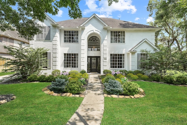 view of front of home with a front yard