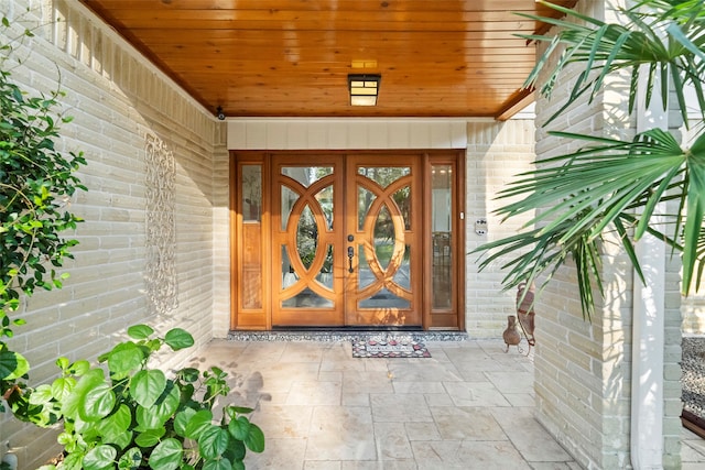 entrance to property featuring french doors