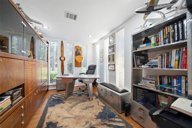 office area featuring light hardwood / wood-style flooring