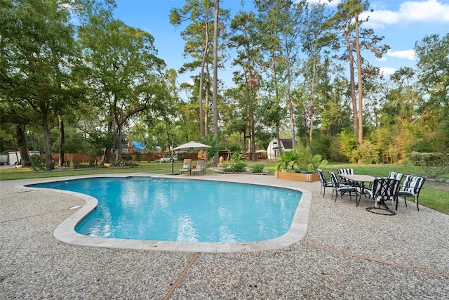 view of pool with a patio area