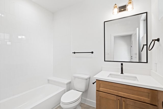 bathroom featuring toilet and vanity