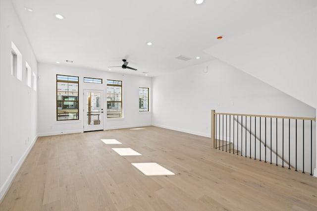 spare room with ceiling fan and light hardwood / wood-style flooring