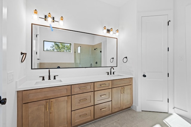 bathroom featuring vanity, tile patterned floors, and a shower with door