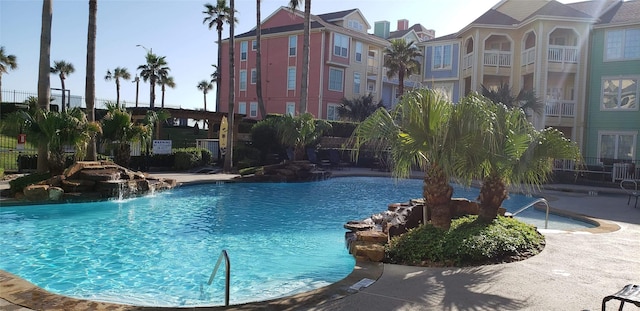 view of pool featuring pool water feature