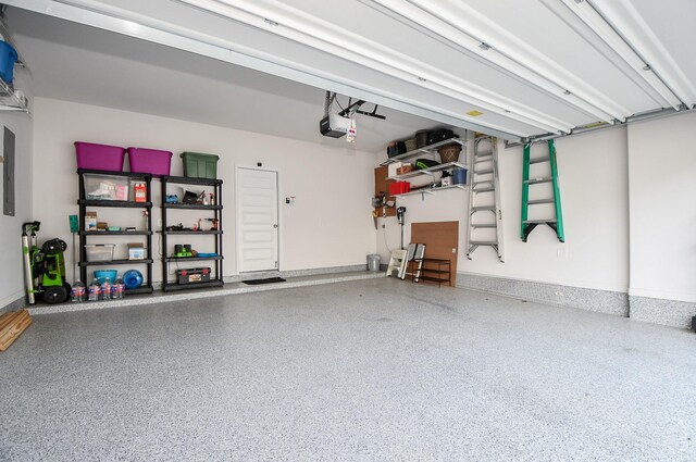 garage featuring a garage door opener