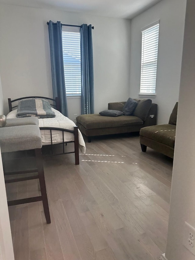 bedroom featuring wood finished floors