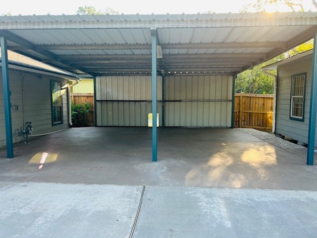 garage featuring a carport