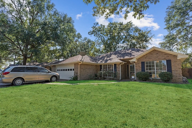 ranch-style house with a front lawn and a garage