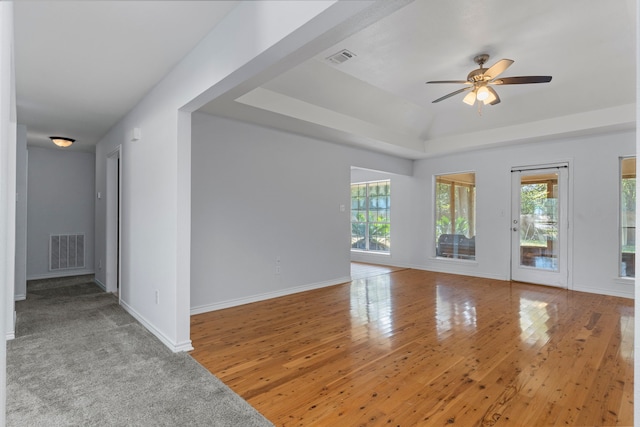 spare room featuring hardwood / wood-style flooring and ceiling fan