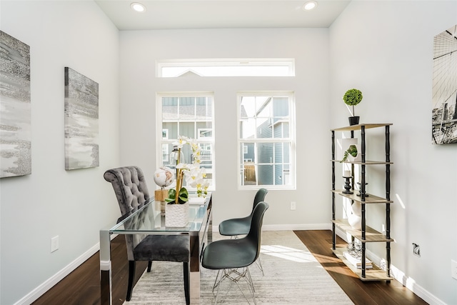 dining area with dark wood-type flooring