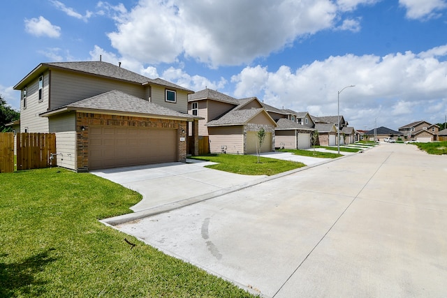 view of front facade featuring a front lawn and a garage