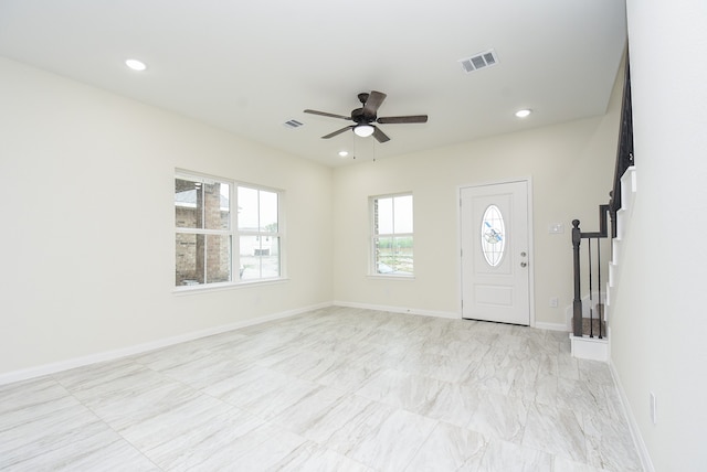 foyer with ceiling fan