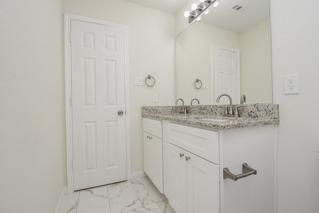 bathroom featuring vanity