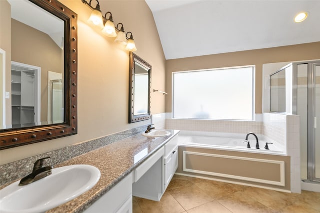 12546 Castlestone Dr, Houston, TX 77065 - full bath with a sink, tile patterned floors, vaulted ceiling, and a shower stall
