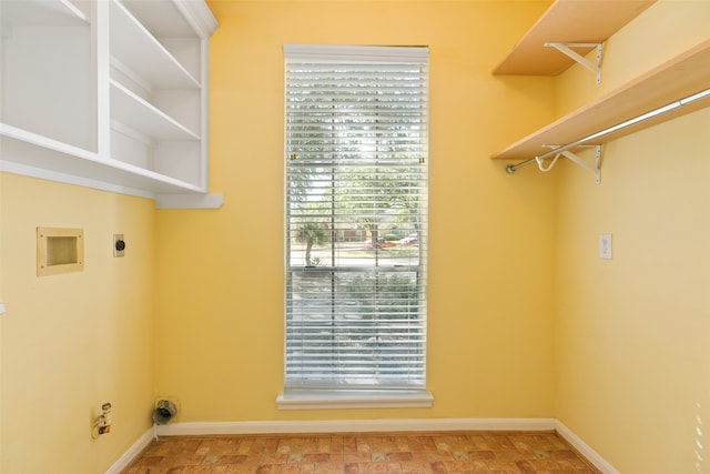 laundry room with electric dryer hookup and hookup for a washing machine