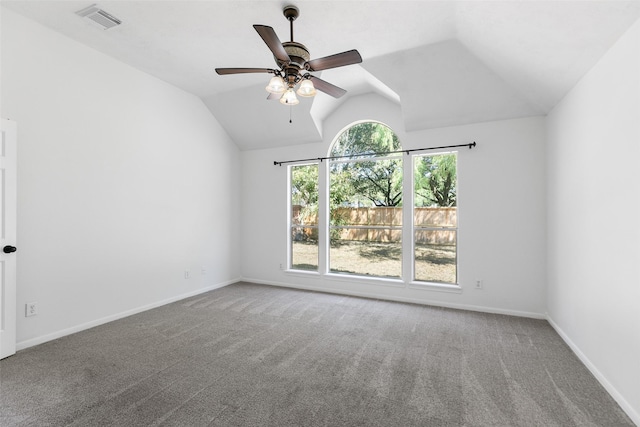 12546 Castlestone Dr, Houston, TX 77065 - carpeted empty room with a ceiling fan, baseboards, visible vents, and vaulted ceiling
