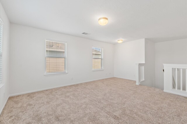 10 Garden Ridge Ct, Manvel, TX 77578 - carpeted empty room with baseboards