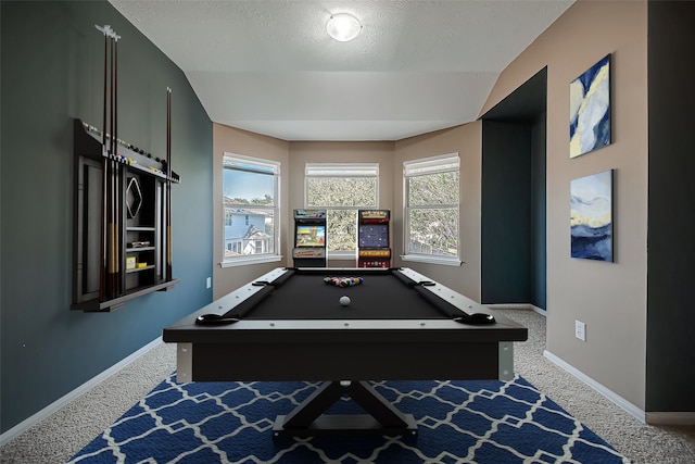 recreation room featuring a textured ceiling, carpet, vaulted ceiling, and pool table