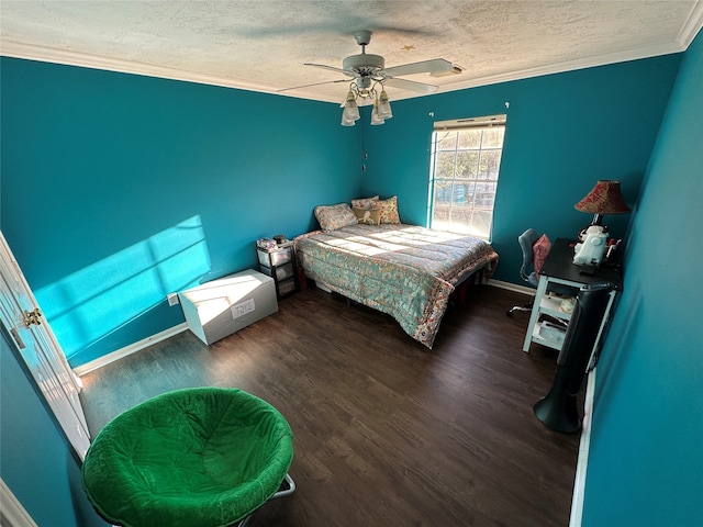 bedroom with ceiling fan, crown molding, a textured ceiling, and dark hardwood / wood-style floors