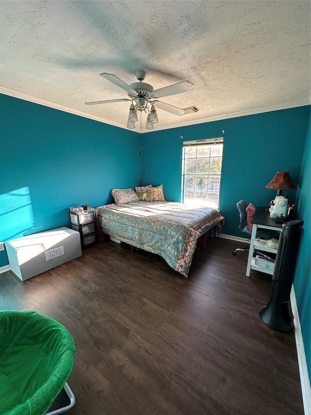 bedroom featuring crown molding, ceiling fan, a textured ceiling, and dark hardwood / wood-style flooring