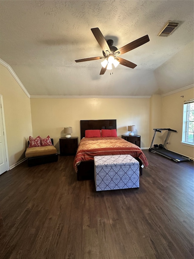 bedroom with dark hardwood / wood-style flooring, lofted ceiling, a textured ceiling, and ceiling fan