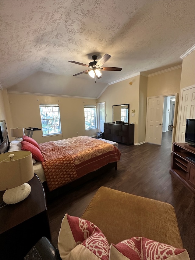 bedroom featuring ceiling fan, ornamental molding, vaulted ceiling, and dark hardwood / wood-style floors