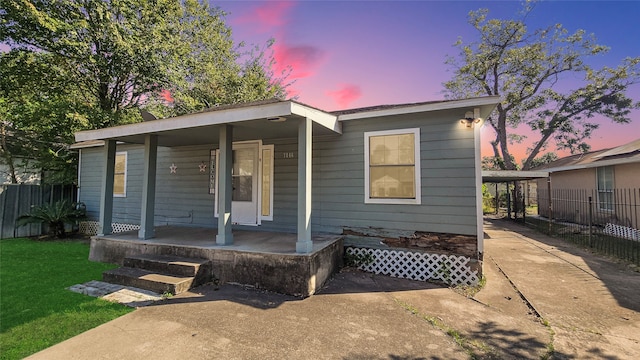 view of front of property featuring covered porch