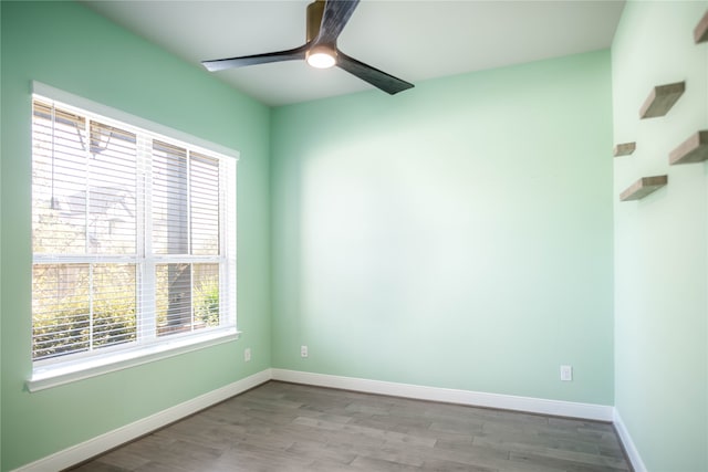 unfurnished room featuring light hardwood / wood-style floors and ceiling fan