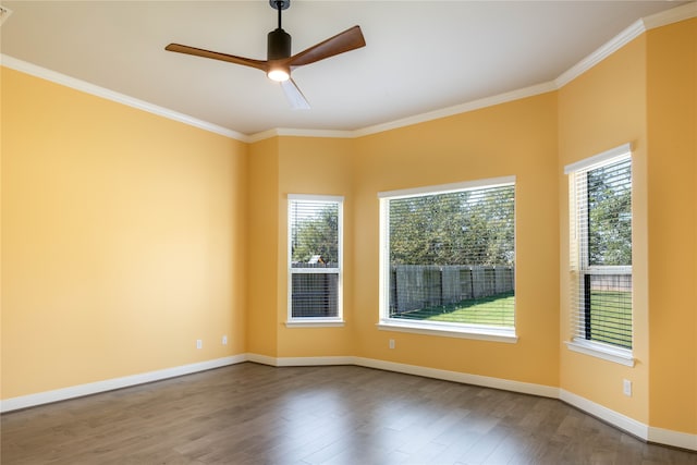 spare room featuring ornamental molding, hardwood / wood-style flooring, and ceiling fan