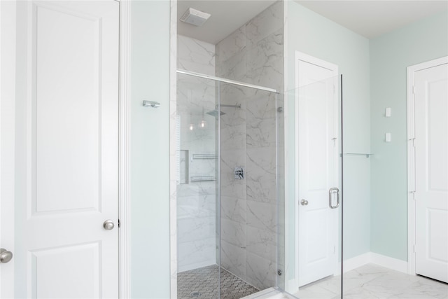 bathroom featuring an enclosed shower