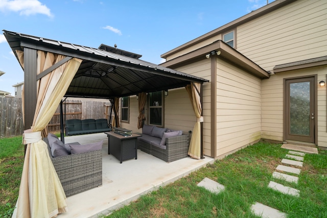 view of patio / terrace featuring an outdoor hangout area and a gazebo