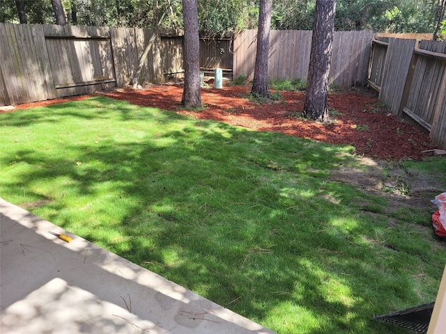 78 Cornflower Dr, The Woodlands, TX 77384 - view of yard featuring a fenced backyard