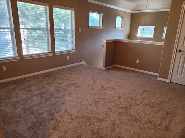 78 Cornflower Dr, The Woodlands, TX 77384 - carpeted spare room with crown molding, baseboards, lofted ceiling, and a healthy amount of sunlight