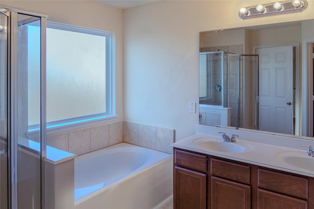 bathroom with vanity and plus walk in shower