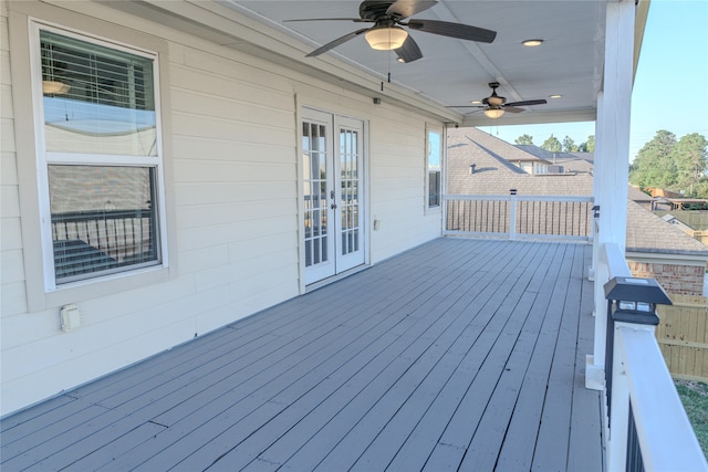 wooden deck with ceiling fan