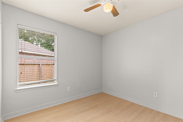 unfurnished room featuring ceiling fan and light wood-type flooring