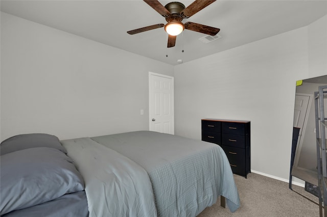 bedroom featuring ceiling fan and light colored carpet