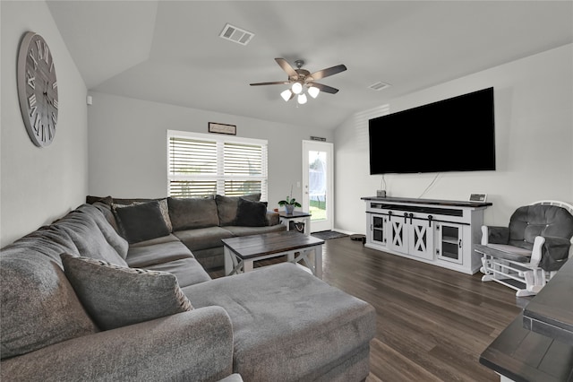 living room featuring lofted ceiling, ceiling fan, and dark hardwood / wood-style floors