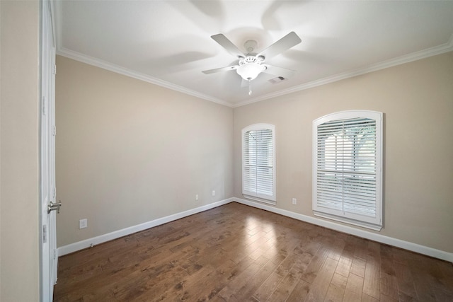 unfurnished room with crown molding, dark wood-type flooring, and ceiling fan