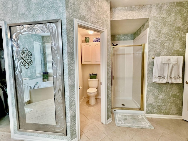 bathroom featuring tile patterned floors, toilet, and an enclosed shower