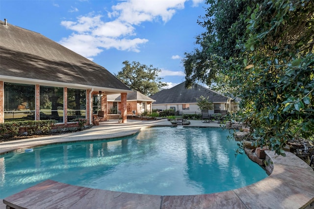 view of pool featuring a patio area