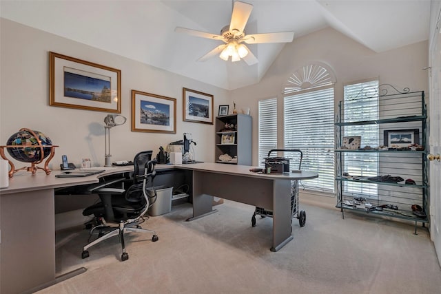 office area featuring plenty of natural light, ceiling fan, light colored carpet, and vaulted ceiling