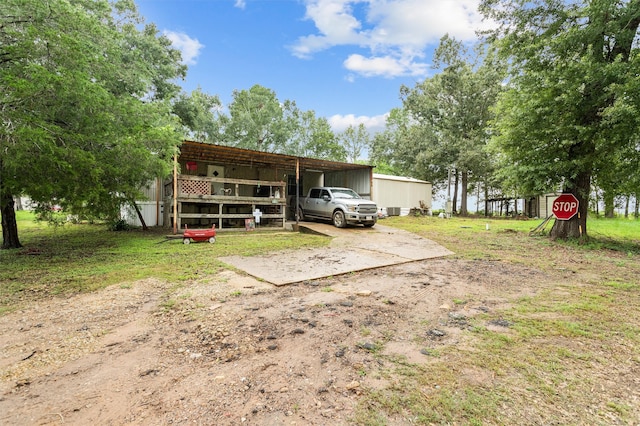 exterior space featuring an outdoor structure