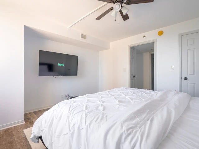 bedroom featuring light wood-type flooring and ceiling fan